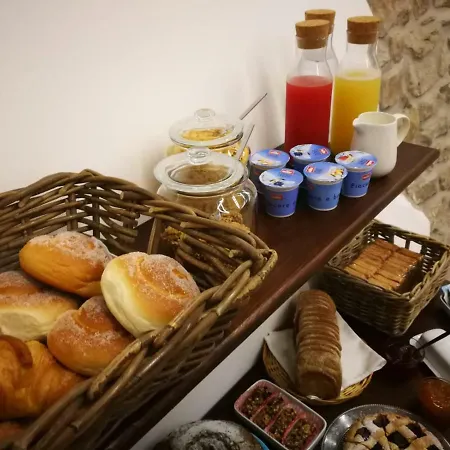 L'orologio Alojamento de Acomodação e Pequeno-almoço Capaccio